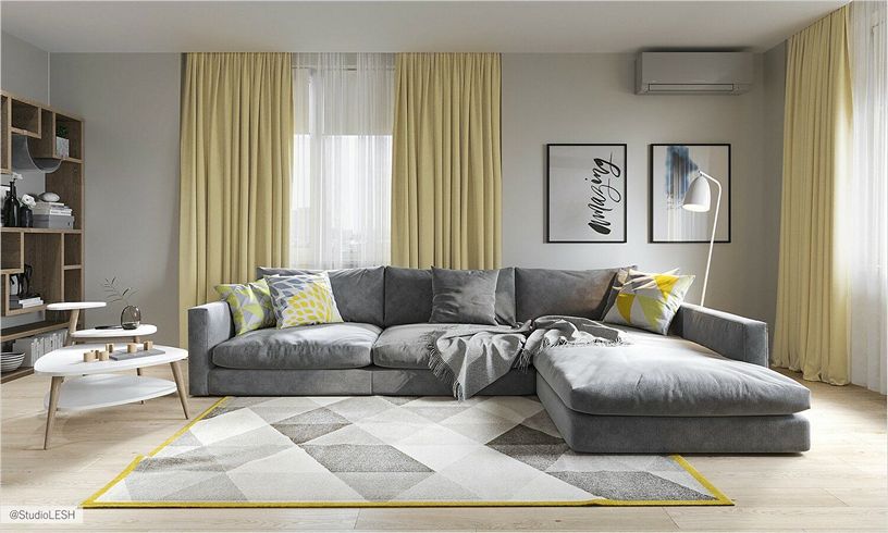 Серый диван в интерьере гостиной и шторы